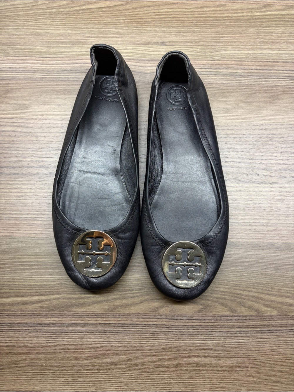 Tory Burch Black Leather Logo Medallion Flats with Gold Emblem